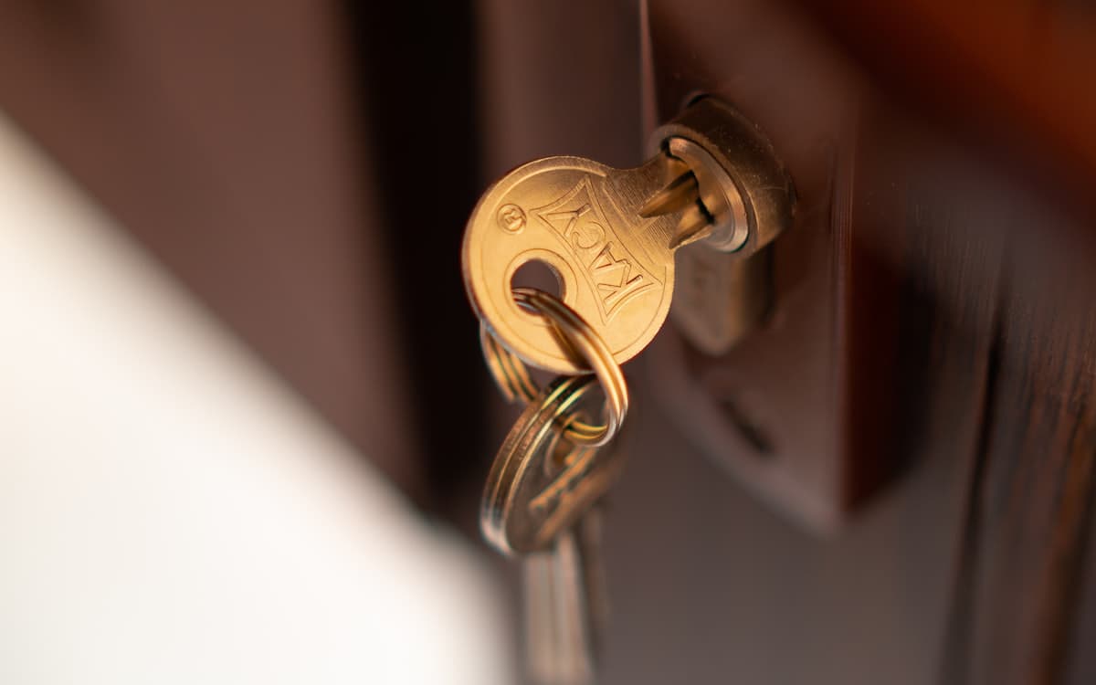 A key turning in a door lock